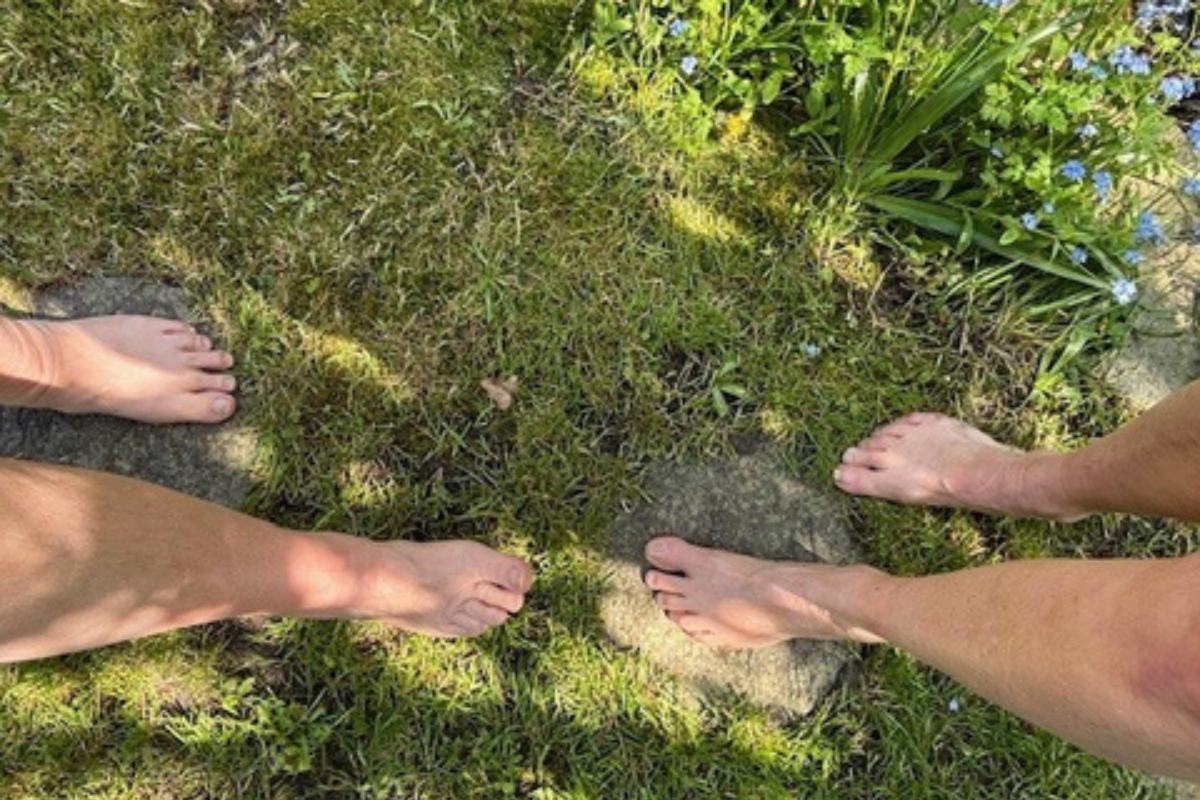 Step by Step image of bare feet on grass